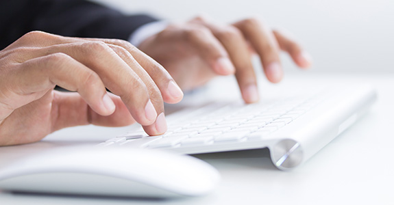 Man typing on the computer